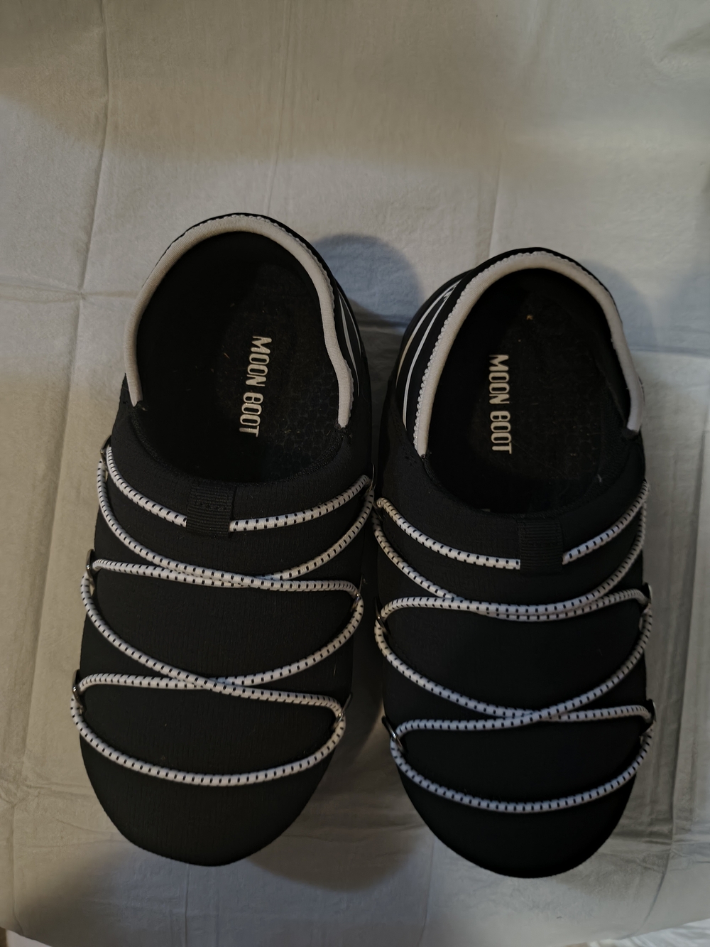 Moon Boot Women’s Black Slip-On Sneakers with White Accents